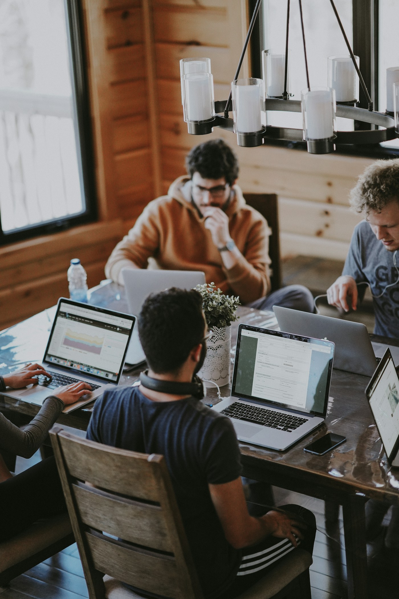 Colleagues evaluating business software together on a laptop